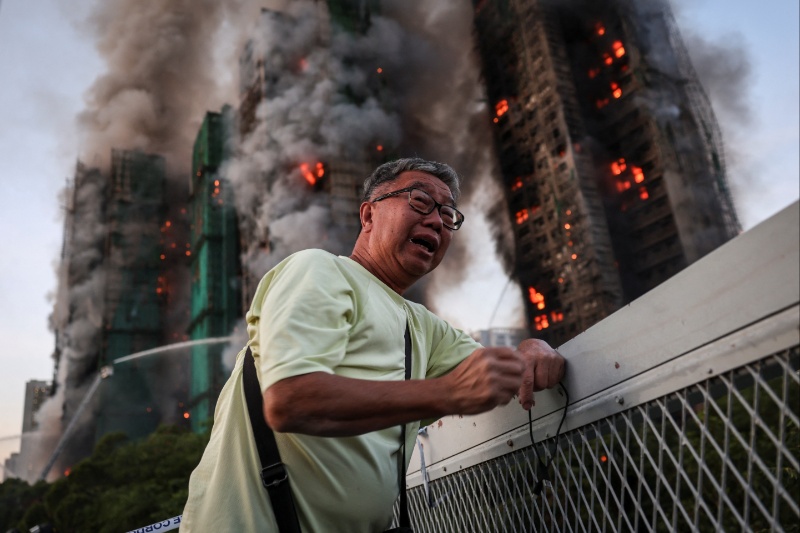 The photo that became a symbol for Hong Kong’s deadly fire
