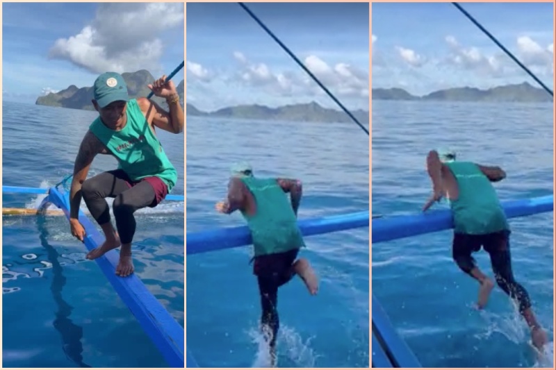 Palawan tour guide ‘runs on water’ by dangling from the side of wooden boat