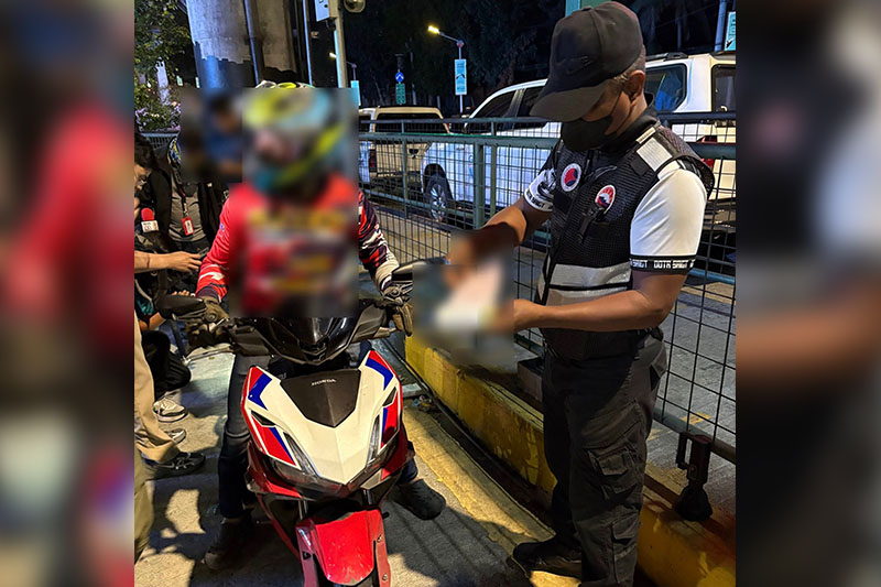Rider caught in EDSA bus lane with altered license plate